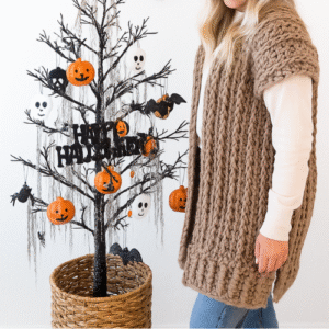 Dune Vest Crochet Pattern worn over a black dress.